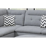 living room sofa with five cushions, velvet grey appearance, armrests