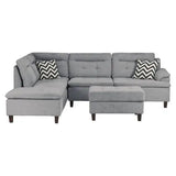living room sofa with five cushions, velvet grey appearance, armrests